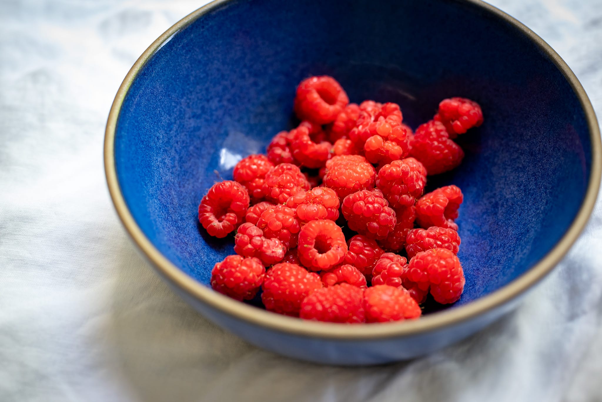 Jumbo raspberries in a bowl