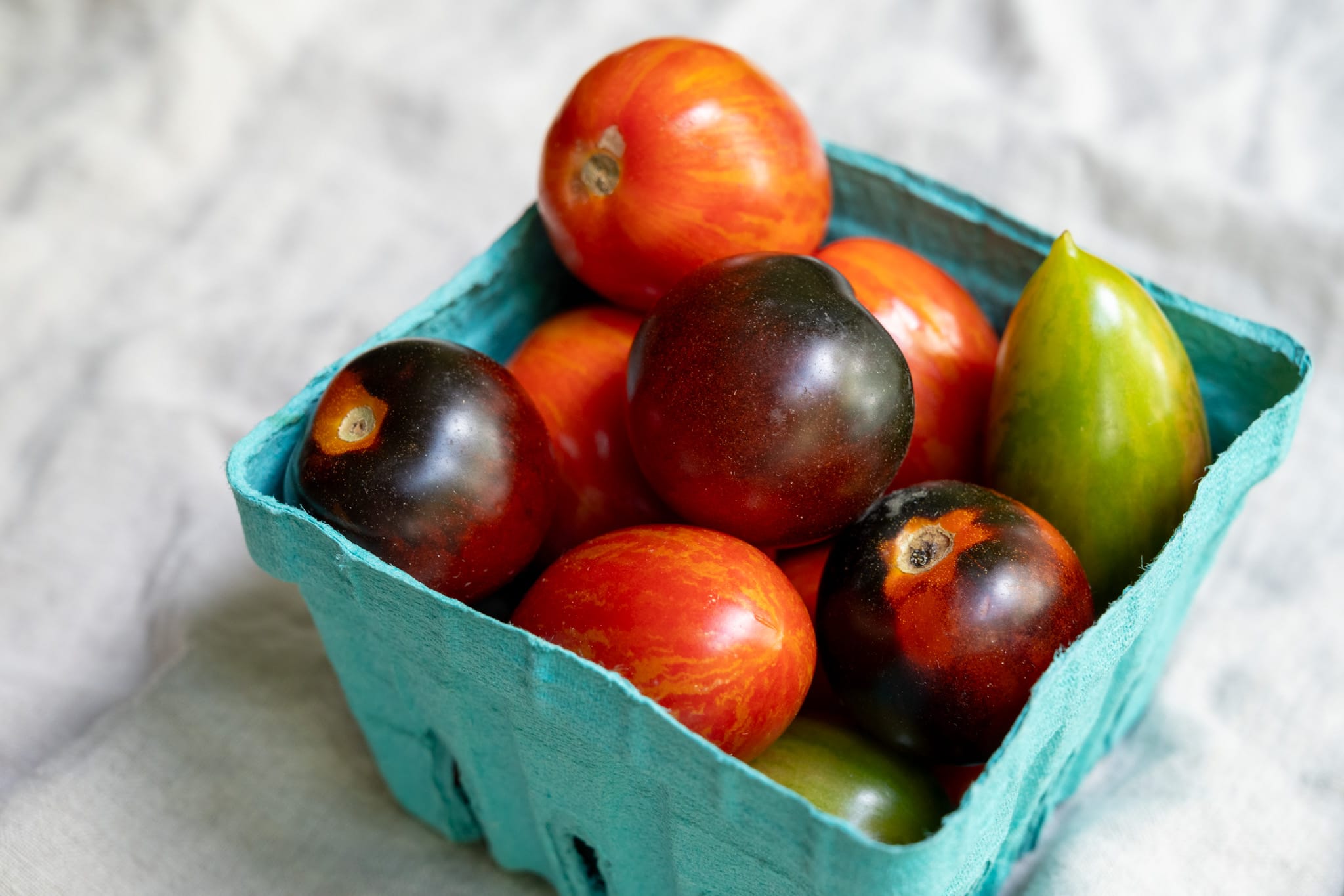Tomatoes in a pint container