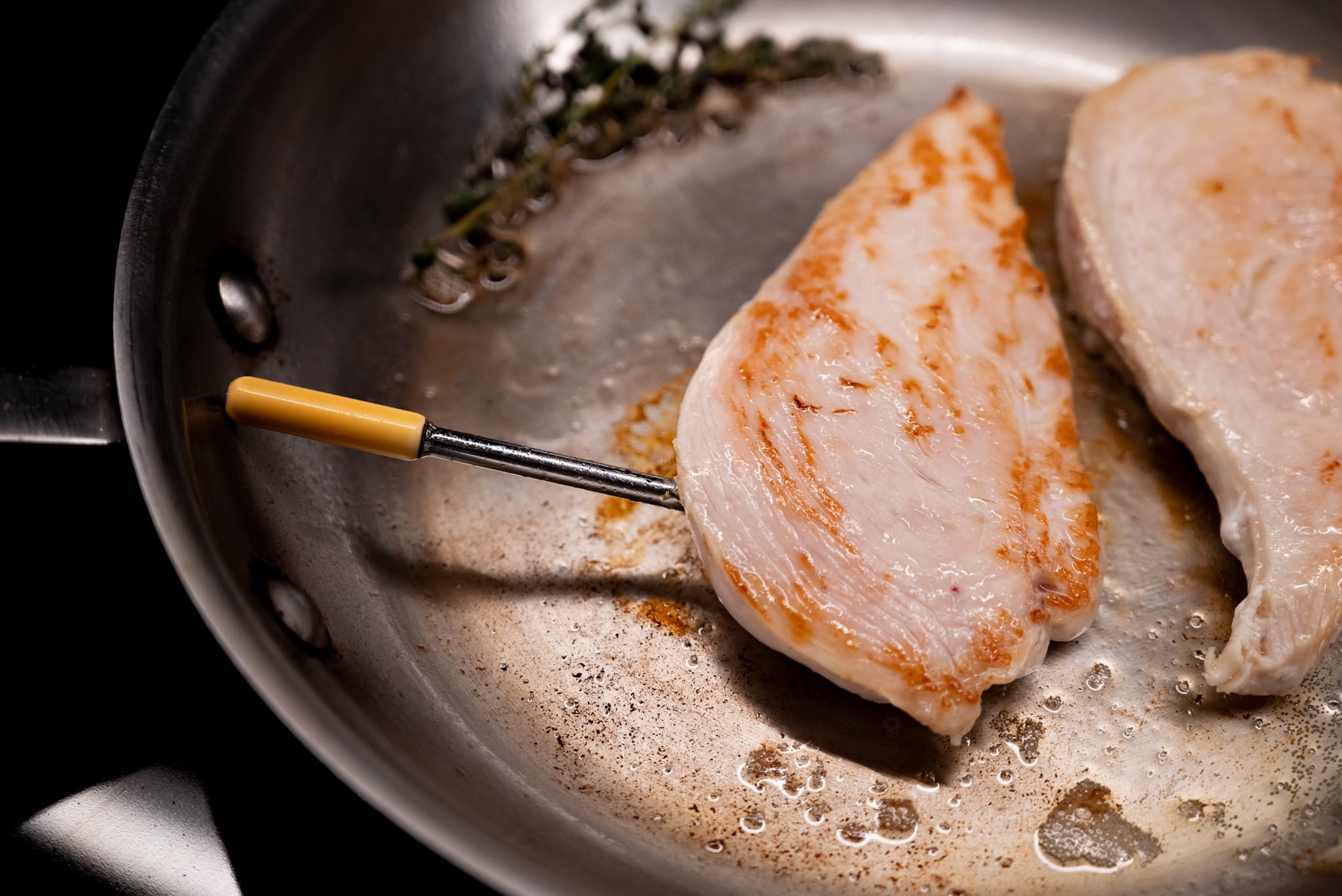 Chicken cooking in a pan