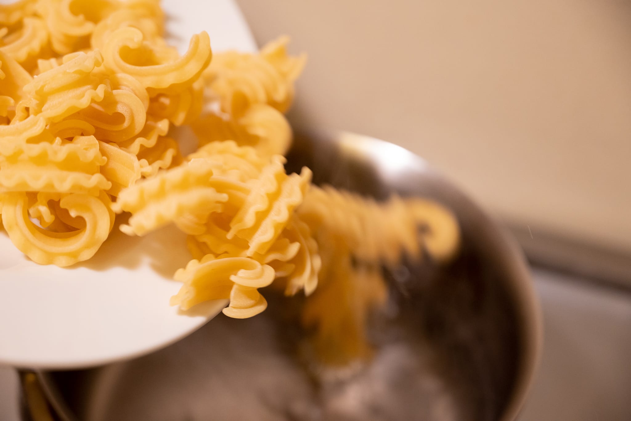 Pasta into water