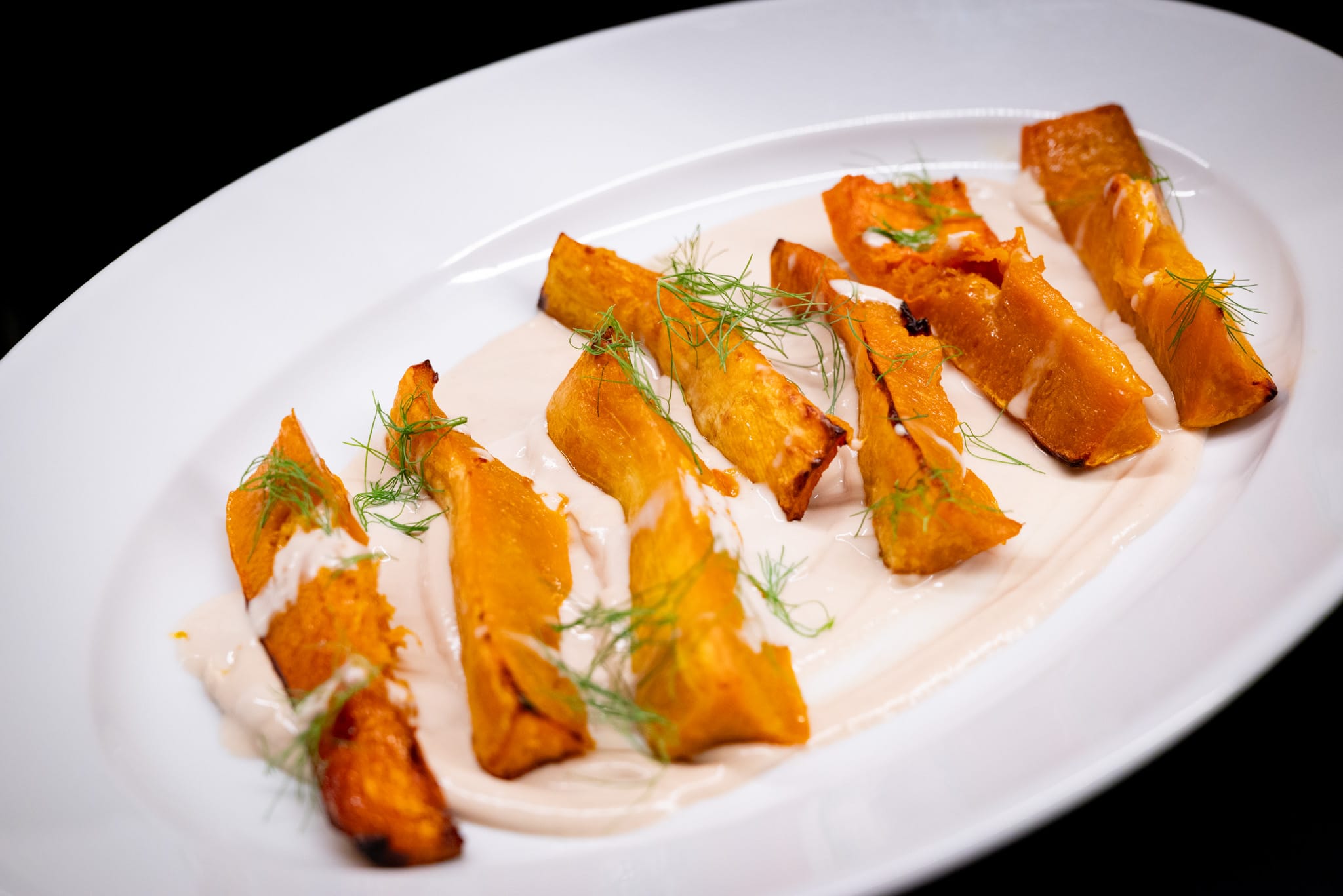 Roasted squash on tahini sauce