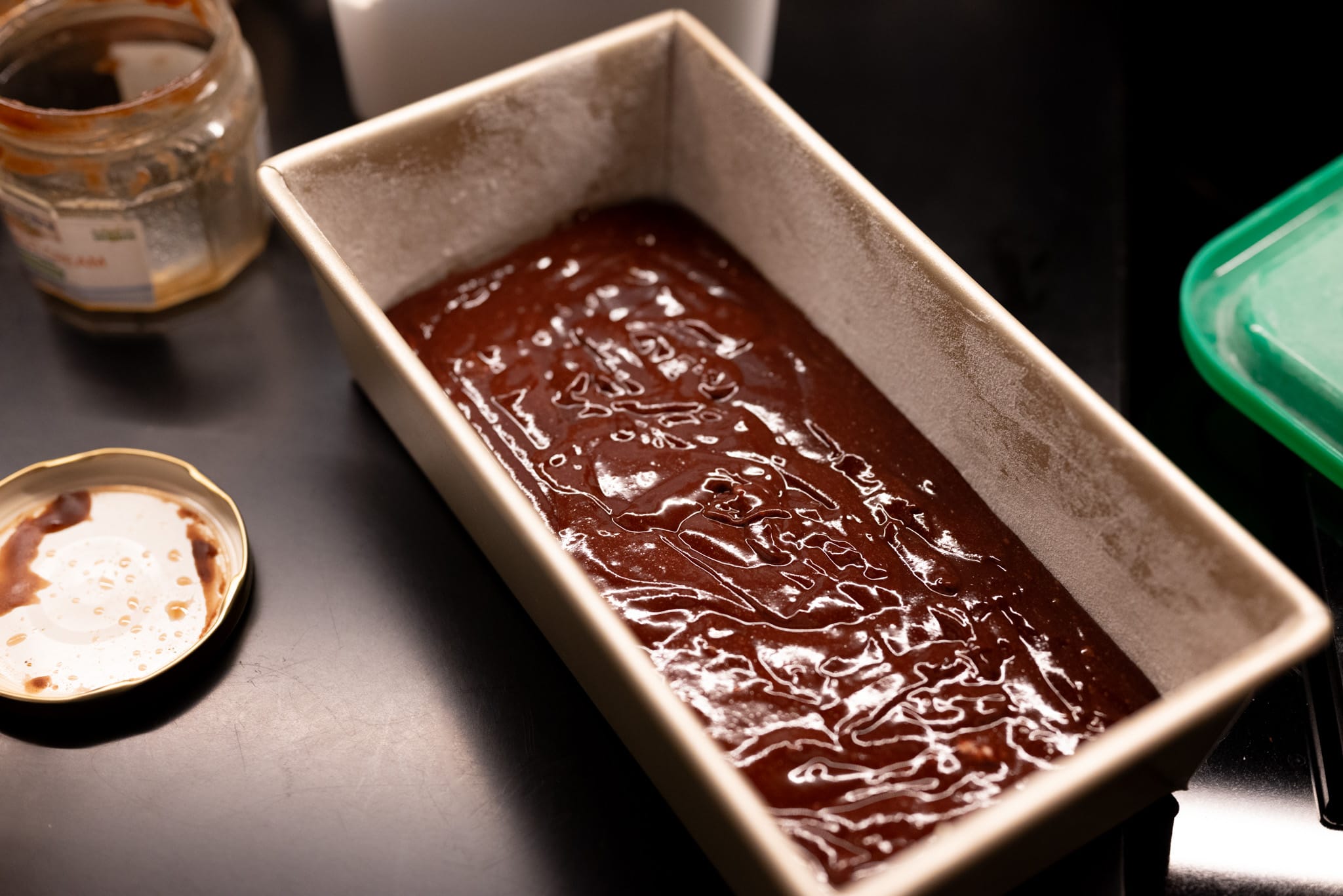 Cake batter in a loaf pan